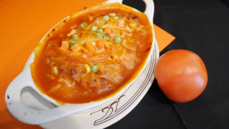 B1. Baked Pork Chop In Tomato Sauce Over Rice