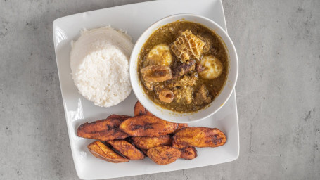 Ayamase Stew Served With White Rice, Boiled Eggs Plantains